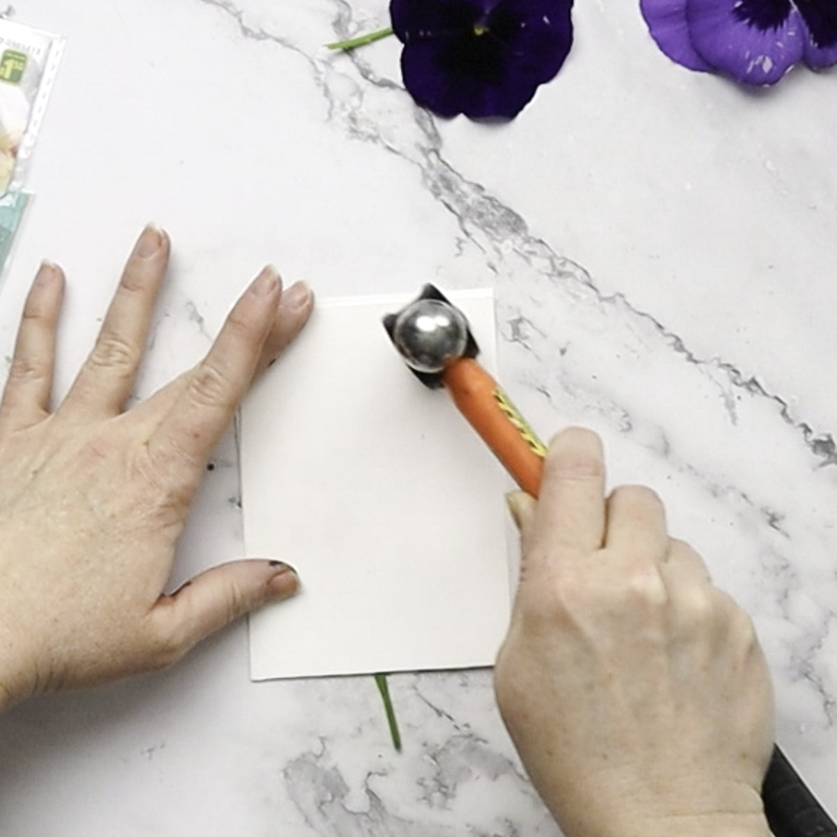 Hammering paper.
